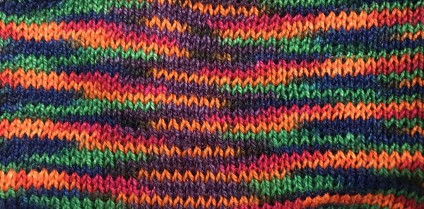 swatch knitted from the hand-painted skein